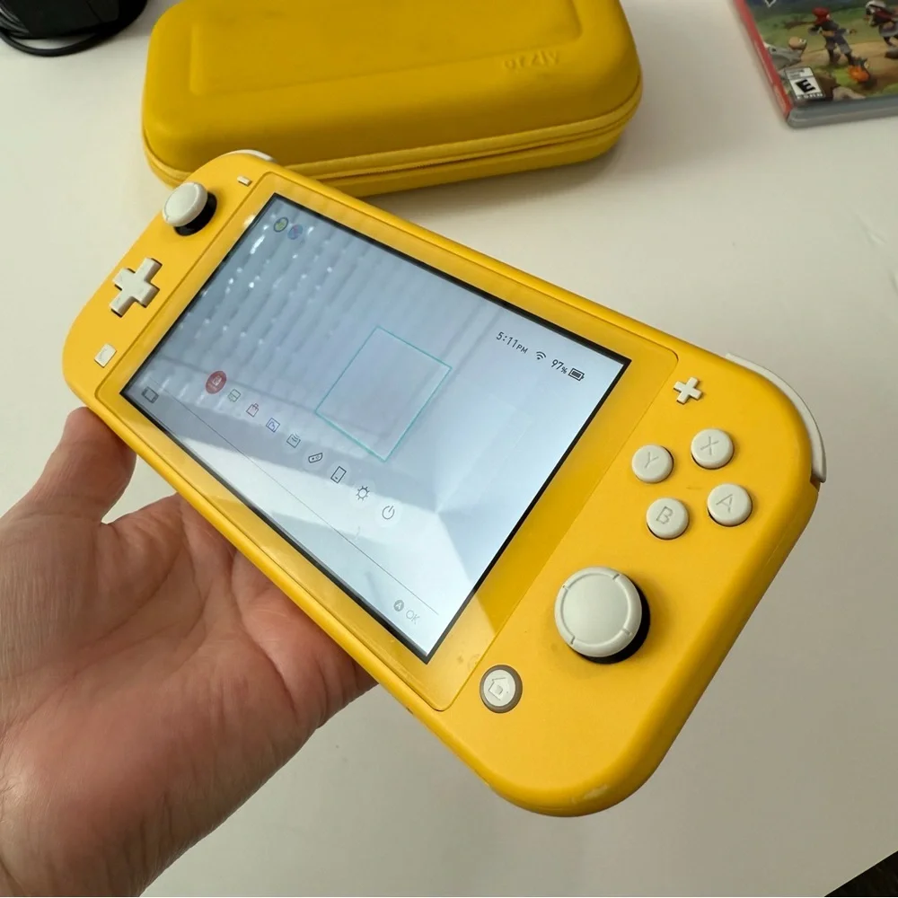 Nintendo Switch Lite in Yellow with Accessories